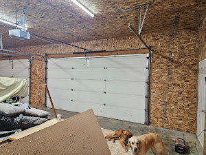 Sheathed garage interior under construction