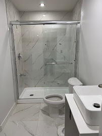 Completed bathroom with glass shower